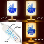 مصباح قماشي مُخصّص، مزين بمسجد وهلال مرسومين بالألوان المائية الزرقاء، مع إمكانية إضافة نص حسب الطلب.